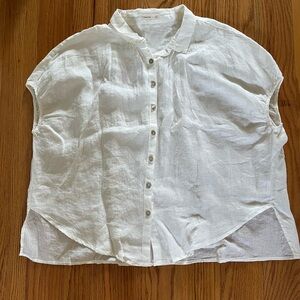 Bright white linen button up shirt. Never worn, size large.